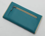 Slim Tri-fold wallet in teal vinyl with tan piping and cotton interior