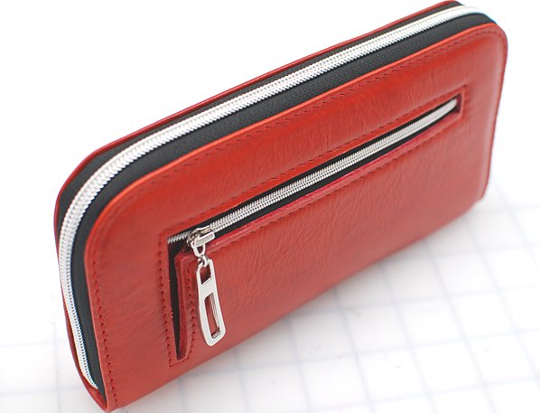 Zippered accordion coin pocket 